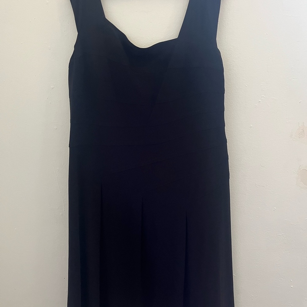 Rich and stylish enjoy this Black Sleeveless Dress